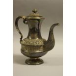 A SILVER COFFEE POT, of baluster form having relief acanthus leaves over central rope banding with