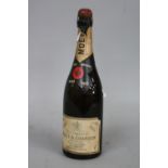 A BOTTLE OF MOET & CHANDON 1953 DRY IMPERIAL CHAMPAGNE, Foil removed but cork intact and