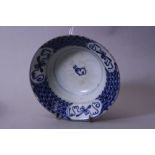 A BLUE AND WHITE ORIENTAL POTTERY BOWL, Rabbit pattern, (shipwreck salvaged item ?), diameter