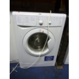 AN INDESIT WASHING MACHINE