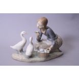 A LLADRO FIGURE GROUP, No.4849, girl feeding ducks with basket of vetetables