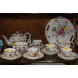 DRESDEN TEAWARES, florally decorated, to include teapot (lid chipped), milk jug, sugar (scratches to