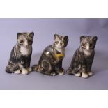 THREE SIGNED WINSTANLEY SEATED TABBY CATS, height approximately 18.5cm (one with chipped ear) (3)