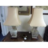 A PAIR OF CERAMIC TABLE LAMPS AND SHADES