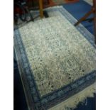 AN OATMEAL GROUND RUG WITH BLUE BORDER, approximate size 212cm x 144cm and another rug (2)