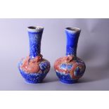 A PAIR OF BRETBY VASES, blue with Dragons, height approximately 22.5cm