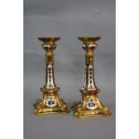 A PAIR OF ROYAL CROWN DERBY IMARI GOLD LINE CANDLESTICKS, '1128' pattern, first quality, printed and