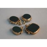 A COLLECTION OF FOUR LATE 19TH CENTURY TO EARLY 20TH CENTURY GOLD SWIVEL FOBS, assorted sizes set