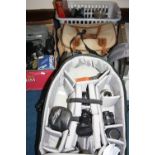 A BILLINGHAM & CO CAMERA BAG, a Lowepro camera ruck sack, a bag and a tray all full of