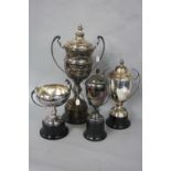 FOUR EPNS TROPHY CUPS, three with covers, all relating to Greyhound Racing, including 'Skol Select