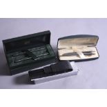 A BOXED CROSS BALLPOINT AND PROPELLING PENCIL SET, finished in chrome and black, comes with original