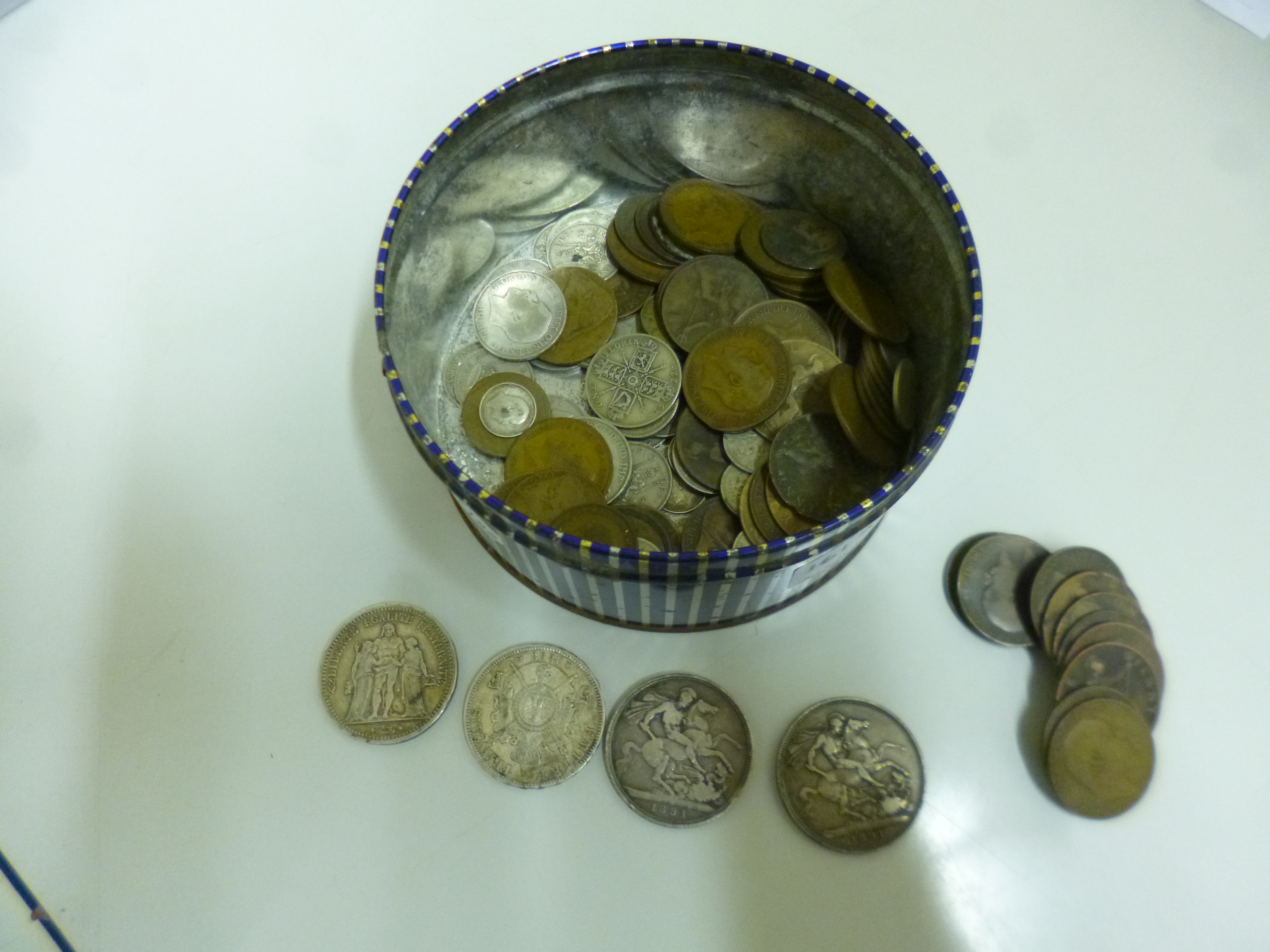 A TIN OF COINS, to include two Victoria crown 1891, France 5 Francs 1848, 1868, other silver