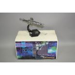 A BOXED FACTORY X PEWTER BABYLON 5 SPACE STATION MODEL, with display stand, missing one of the