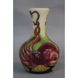 A MOORCROFT LIMITED EDITION BOTTLE SHAPED OCTOPUS VASE, by Philip Richardson, No.72/150, impressed