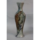 A MOORCROFT TRIAL VASE, of baluster form with three vertical fish breaking the surface of the water,