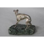 A MODERN SILVER TROPHY, in the form of a greyhound, with front paw raised, mounted on a green and