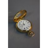 A LADIES 18CT GOLD AND ENAMEL HALF HUNTER FOB WATCH, with pink enamel chapter ring to case and white