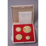 GOLD MEDALS CHURCHILL COMMEMORATIVES, 4 x 18K boxed medals 57.5g with certificates