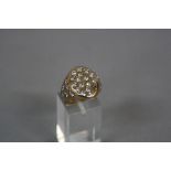 A MID 20TH CENTURY DIAMOND SET SIGNET RING, oval shape head measuring approximately 19mm x 14mm,