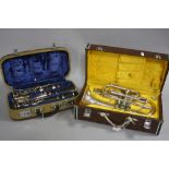 A CASED LE BLANC NOBLET CLARINET, and a cased Dellman Cornet (2)