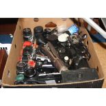 A BOX OF SLR AND INSTANT CAMERA EQUIPMENT, including two Olympus OM10 and OM30, various Olympus