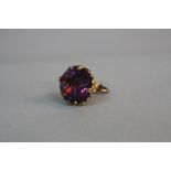 A MID 20TH CENTURY 9CT GOLD AMETHYST FOB, round circular faceted amethyst measuring approximately