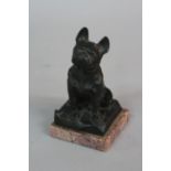 AFTER P. DREUX, a bronze study of a seated French Bulldog, signed, mounted on a pink marble base,