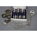 A PARCEL OF SILVER SPOONS, NAPKIN RINGS, etc, including a set of six cased and boxed golf coffee