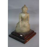 A CARVED ALABASTER FIGURE OF A BUDDHA, Calling The Earth to Witness, repair to neck, mounted on a