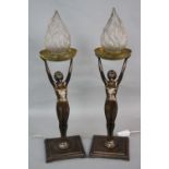 A PAIR OF REPRODUCTION ART DECO STYLE BRONZED FIGURAL TABLE LAMPS, each cast as a nude female