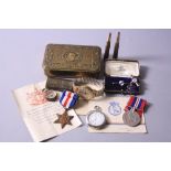 A 1914 PRINCESS MARY TIN, containing an original greeting slip, two bullet pencils, a small escape