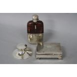 A GEORGE VI SILVER AND CROCODILE SKIN MOUNTED GLASS HIP FLASK, bayonet fitting, pull off sleeve/cup,