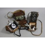 A ROLLEICORD TLR CAMERA, in leather case, lens Serial No.1756990, a Eumig Electric R Cine camera