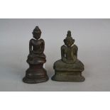 TWO CAST BRONZE SEATED BUDDHA FIGURES, one Calling The Earth to Witness, height approximately