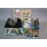 A COLLECTION OF STAMPS AND PICTURE POSTCARD