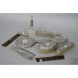 A BOX OF SILVER BACKED DRESSING TABLE REQUISITES, including a Victorian style four piece dressing