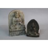 A CARVED BLACK STONE DOUBLE SIDED BUDDHA, with arched shape surround, buddha in Meditation pose,