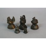 FIVE BRONZE OPIUM WEIGHTS, cast as dragons and birds, height approximately 7cm to 3cm (5)