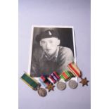 A GROUP OF FIVE WWII MEDALS, namely 1939-45 Star, Africa Star, Defence & War Medal (All un-named),