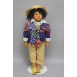 A BOXED GOTZ DOLL, nape of neck marked with signature 'Gotz 92 225 20-10', vinyl head, shoulders,