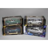 FOUR BOXED DIECAST MAISTO JAGUAR CAR MODELS, XJ220, XK180, X-Type and 1959 MKII, all 1:18 scale