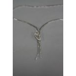 A 14CT WHITE GOLD AND DIAMOND NECKLET, approximate weight 17.5 grams