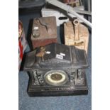 A LATE VICTORIAN BLACK SLATE AND MARBLE MANTEL CLOCK, with key and pendulum, together with a vintage