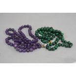 TWO GEMSTONE BEAD NECKLETS, one amethyst bead necklet, measuring approximately 720mm in length,