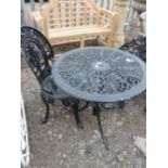 A BLACK PAINTED CAST ALUMINIUM CIRCULAR GARDEN TABLE AND CHAIR (2)