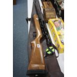 A 22' B.S.A MK5 METEOR AIR RIFLE, serial No TH 21915 fitted with a scope and comes with a carry