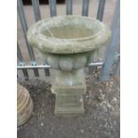 A PRE-CAST GARDEN URN, on seperate plinth, approximate height 95cm, (sd)