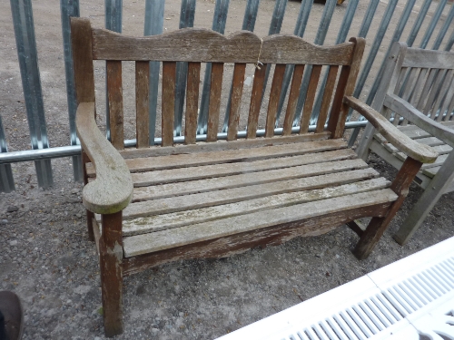 A HARDWOOD SLATTED GARDEN BENCH, approximate length 130cm