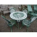 A PAINTED CAST ALUMINIUM CIRCULAR GARDEN TABLE, approximate diameter 80cm and four chairs (5)