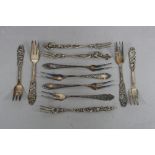 ELEVEN ASSORTED. 800 STANDARD WHITE METAL PASTRY AND PICKLE FORKS, two sets of four and a matched